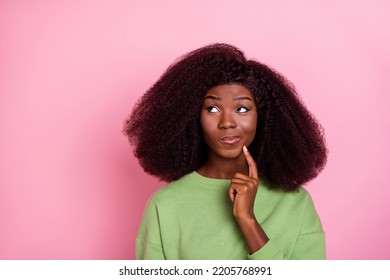 Photo Of Unsure Big Hairdo Brunette Lady Think Look Up Wear Green Sweatshirt Isolated On Pink Color Background