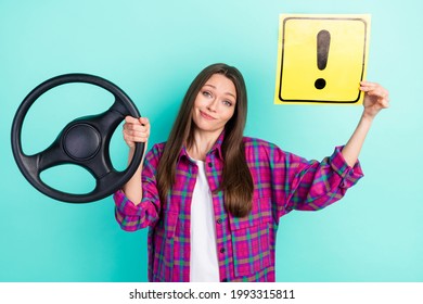 Photo of unsure straight hairdo young lady drive car hold warner wear checkered shirt isolated on vivid teal color background
