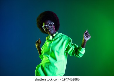 Photo Of Vintage 80s Lady Dance Have Fun Wear Headphones Specs Sweatshirt Isolated Gradient Green Neon Background