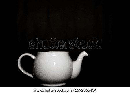 Similar – Tea set on dark background