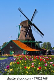 Photo Of Windmill In Holland With Blue Sky