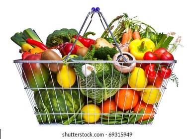 Photo Of A Wire Shopping Basket Full Of Fresh Fruit And Vegetables, Isolated On A White Background.