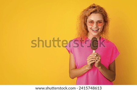 photo of woman with icelolly ice cream at summer, copy space. woman with icelolly ice cream
