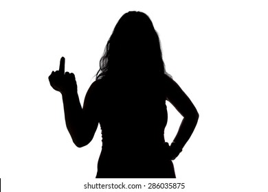 Photo of woman's silhouette showing middle finger on white background