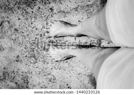 Photo of a Women's feet and legs with colored nail polish on toes, Cape Town, South Africa
