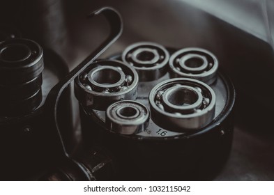 Photo Of Working Bearings. Made In Silver Color. Under The Bearings Is A Monolith.