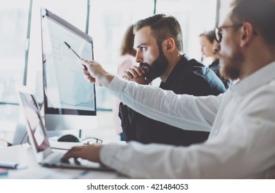 Photo working process.Finance trade manager showing reports screen.Young business crew work with startup project modern office.Desktop computers on table, presentation new idea.Film effect.Horizontal. - Shutterstock ID 421484053