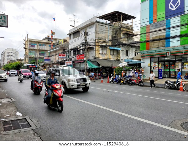 The\
photo of Yaowarach street in Bangkok China town and its building\
next to  the road. Bangkok, Thailand July 24,\
2018