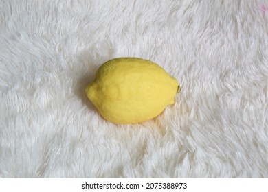 Photo Of Yellow Lemons On Fleece Blanket Background