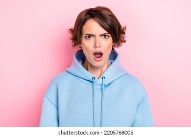 Photo Of Young Adorable Pretty Cute Nice Gorgeous Woman Wear Blue Sweater Open Mouth Unhappy Speechless Funny Reaction Isolated On Pink Color Background