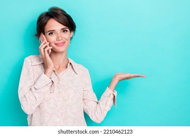 Photo of young adorable pretty gorgeous cute girl hold palm showing demonstrating new product information ad isolated on aquamarine color background - Shutterstock ID 2210462123