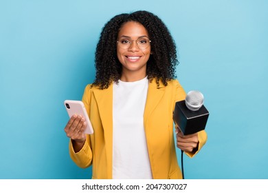 Photo Of Young African Woman Use Smartphone Journalist News Interview Speak Isolated Over Blue Color Background