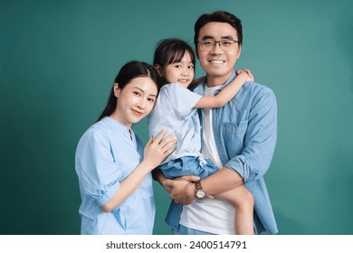 Photo of young Asian family on background - Powered by Shutterstock