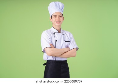 Photo of young Asian male chef on background - Powered by Shutterstock