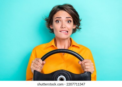 Photo Of Young Attractive Nice Pretty Cute Lady Wear Office Yellow Shirt Bite Lips Nervous Oops Sorry Accident Driving Isolated On Cyan Color Background