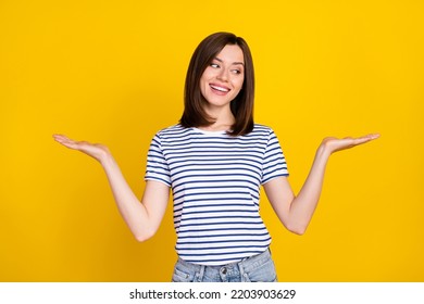 Photo of young attractive nice woman hold hands manager assistant help choose best option isolated on yellow color background - Shutterstock ID 2203903629