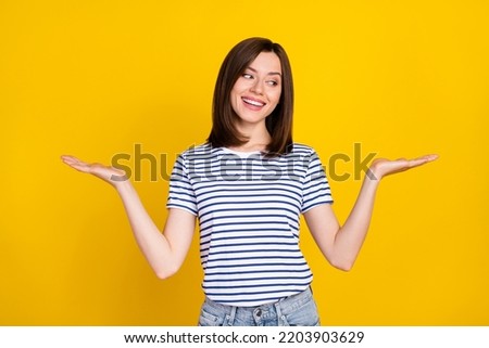 Photo of young attractive nice woman hold hands manager assistant help choose best option isolated on yellow color background