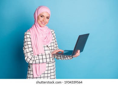 Photo Of Young Beautiful Muslim Business Woman Type Email Computer Happy Smile Wear Hijab Isolated Over Blue Color Background