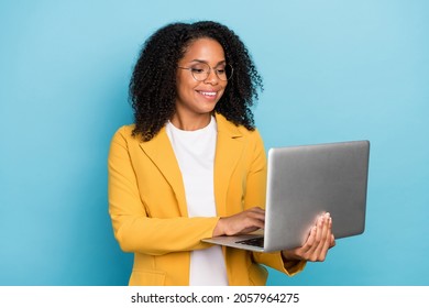 Photo Of Young Black Business Woman Happy Smile Type Project Report Laptop Isolated Over Blue Color Background