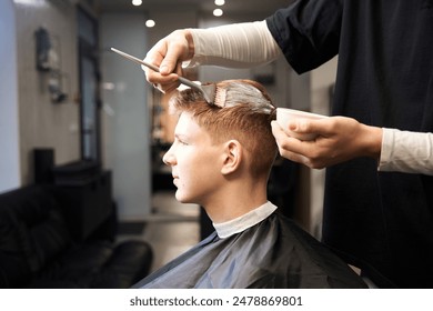 Photo of young boy in contemporary hairdressing salon - Powered by Shutterstock