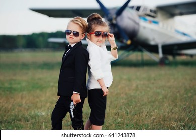 Photo Of Young Boy And Girl Playing Spy