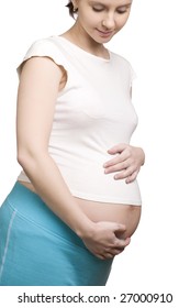 a photo of young caucasian pregnant woman