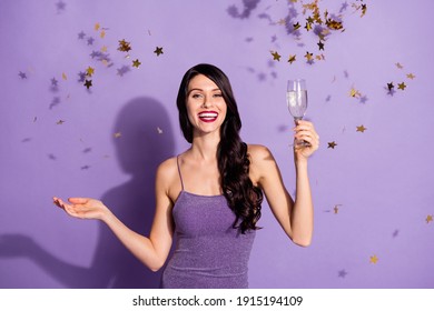 Photo of young charming girl happy positive smile celebration drink champagne fly confetti isolated over violet color background - Powered by Shutterstock