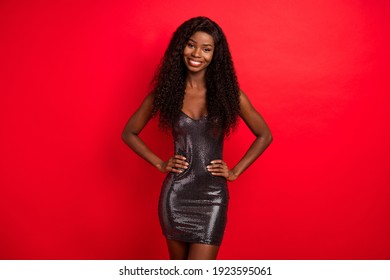 Photo of young cheerful african woman happy positive smile wear gorgeous dress isolated over red color background