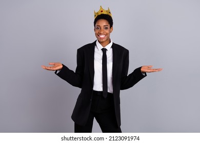 Photo of young cheerful girl guy demonstrate hands wear golden crown isolated over grey color background
