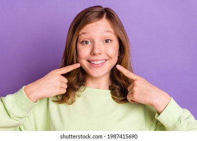 Photo Of Young Cheerful Girl Happy Positive Smile Point Fingers Teeth Stomatology Isolated Over Violet Color Background