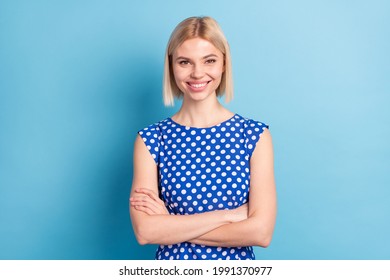 Photo of young cheerful girl happy positive smile confident folded hands isolated over blue color background - Shutterstock ID 1991370977