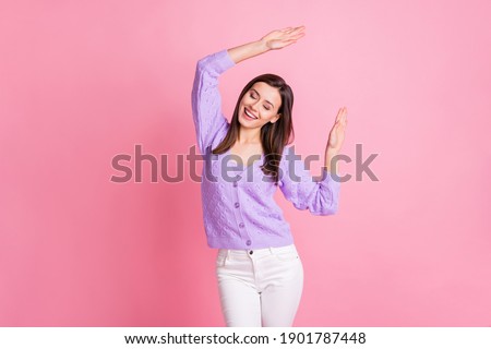 Photo of young cheerful girl happy positive smile have fun enjoy dance disco isolated over pink color background