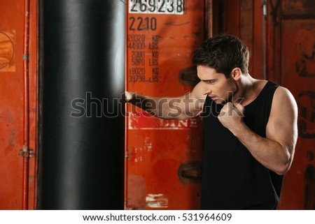 Similar – Image, Stock Photo Young sportsman drinking water after jogging