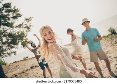 Photo of young cool company dance have fun on holiday trip wear trend look by the beach - Powered by Shutterstock