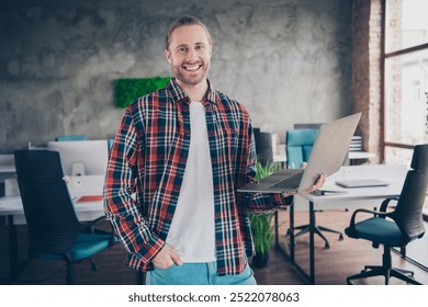 Photo of young corporate man hodl laptop wear shirt loft interior modern office indoors - Powered by Shutterstock