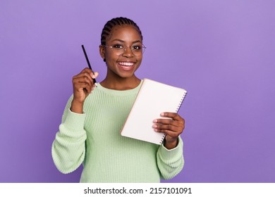 Photo Of Young Creative Female Author Find Imagination New Ideas For New Book Isolated On Purple Color Background