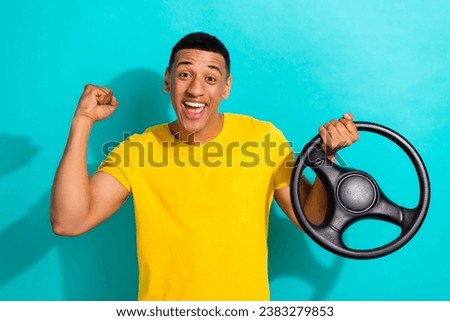 Photo of young excited man buy his first automobile celebrate now he member volkswagen club brand isolated on aquamarine color background