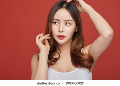 Photo Of Young Girl With Flawless Skin On Red Background. Skin Care And Beauty Concept