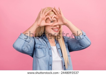 Photo of young girl look eye show heart symbol date romance cupid isolated over pink color background