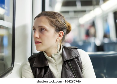 Photo Of Young Girl Passanger Sitting Inside Train 