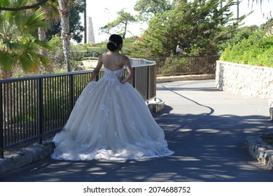 Quinceañera Photo Of Young Girl Posing In Ball Gown