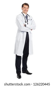 Photo of a young handsome doctor smiling and standing with his arms crossed.