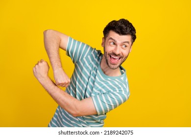 Photo of young handsome funny smiling man look for new adventures laugh dancing isolated on bright yellow color background