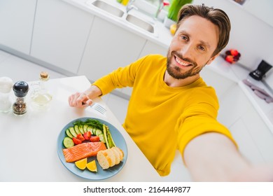 Photo Of Young Handsome Man Eat Healthy Food Supper Make Take Selfie Blogger Kitchen Restaurant Indoors