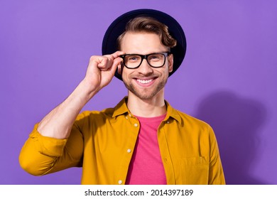 Photo Of Young Handsome Man Happy Positive Smile Hand Touch Eyeglasses Isolated Over Violet Color Background