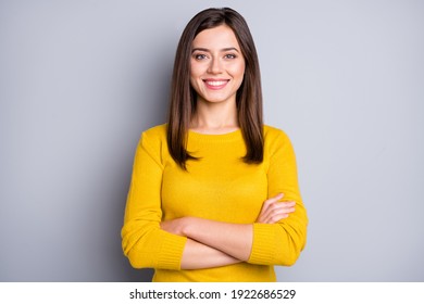 Photo of young happy cheerful positive smiling girl with crossed hands wear yellow jumper isolated on grey color background - Powered by Shutterstock