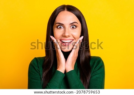 Photo of young happy excited amazed crazy girl hold hands cheeks see big sale discount isolated on yellow color background