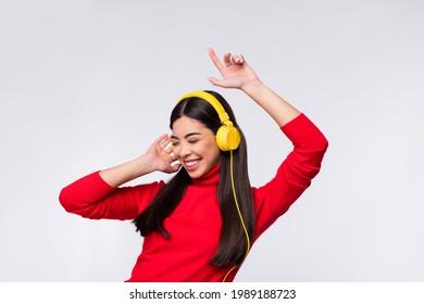 Photo Of Young Happy Excited Beautiful Korean Girl Dancing Listen Music In Headphones Isolated On Grey Color Background