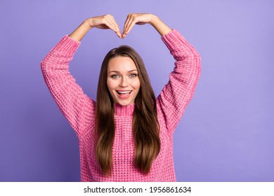 Photo of young happy excited smiling cheerful woman showing heart sign shape isolated on violet color background - Shutterstock ID 1956861634