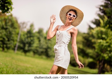 Photo Of Young Happy Joyful Nice Woman Wear Hat Summer Walk Wave Hand Hello Nice Outside Outdoors Park Street